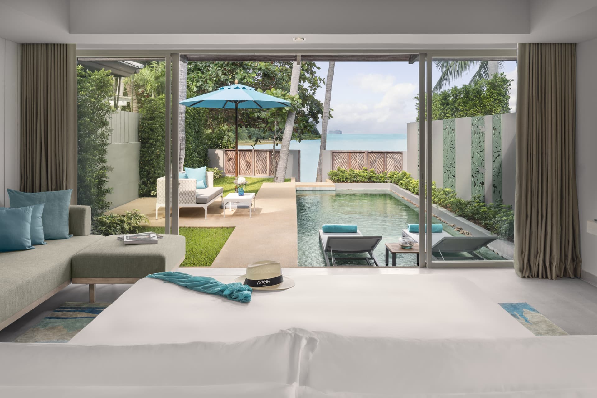 Private pool vila at Avani+ Samue, Kho Samui Thailand. Looking out from bed over to the bay