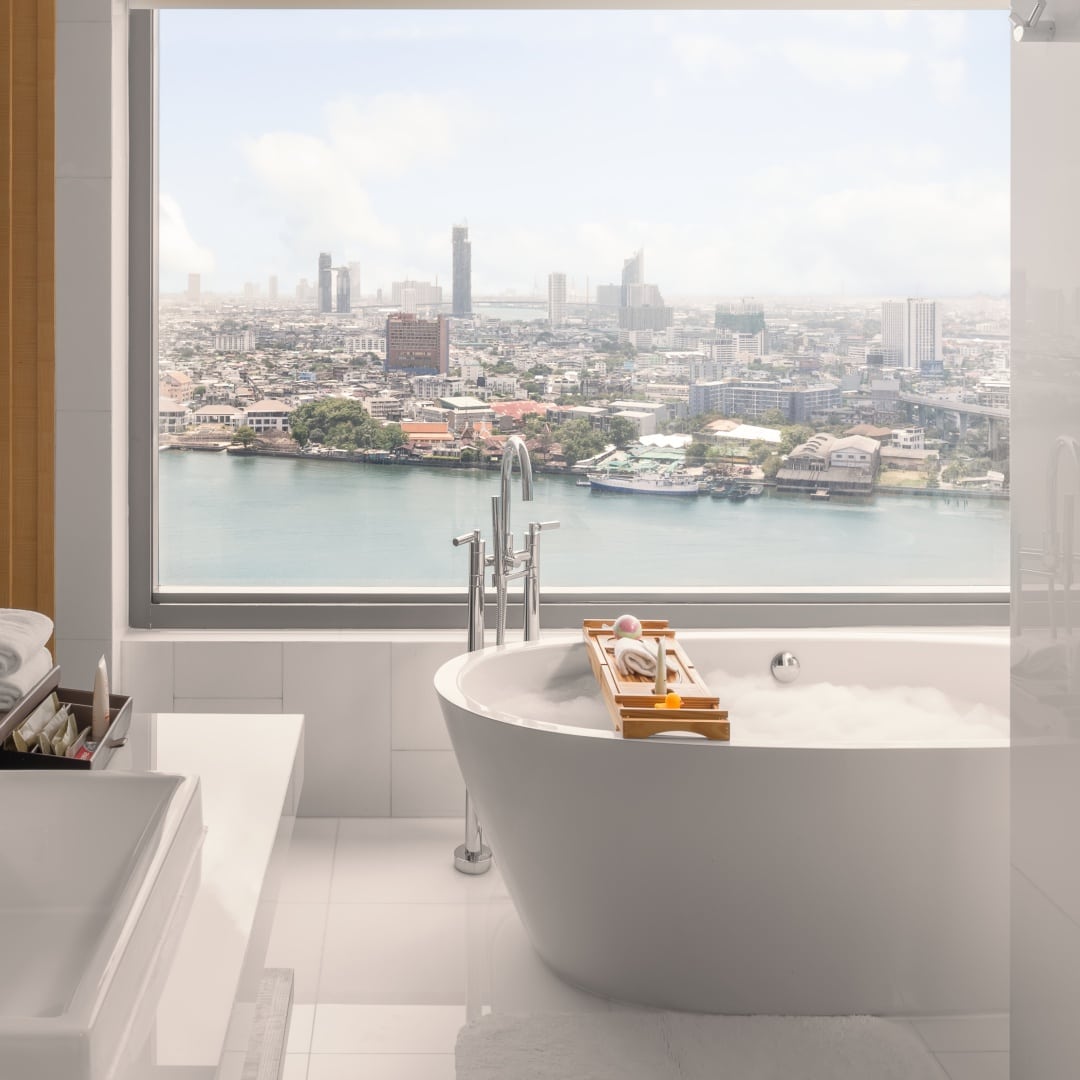 View over Bangkok from the bathroom of one of the suites at Avani Riverside Bangkok Hotel in Thailand